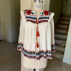 Embroidery throughout jacket